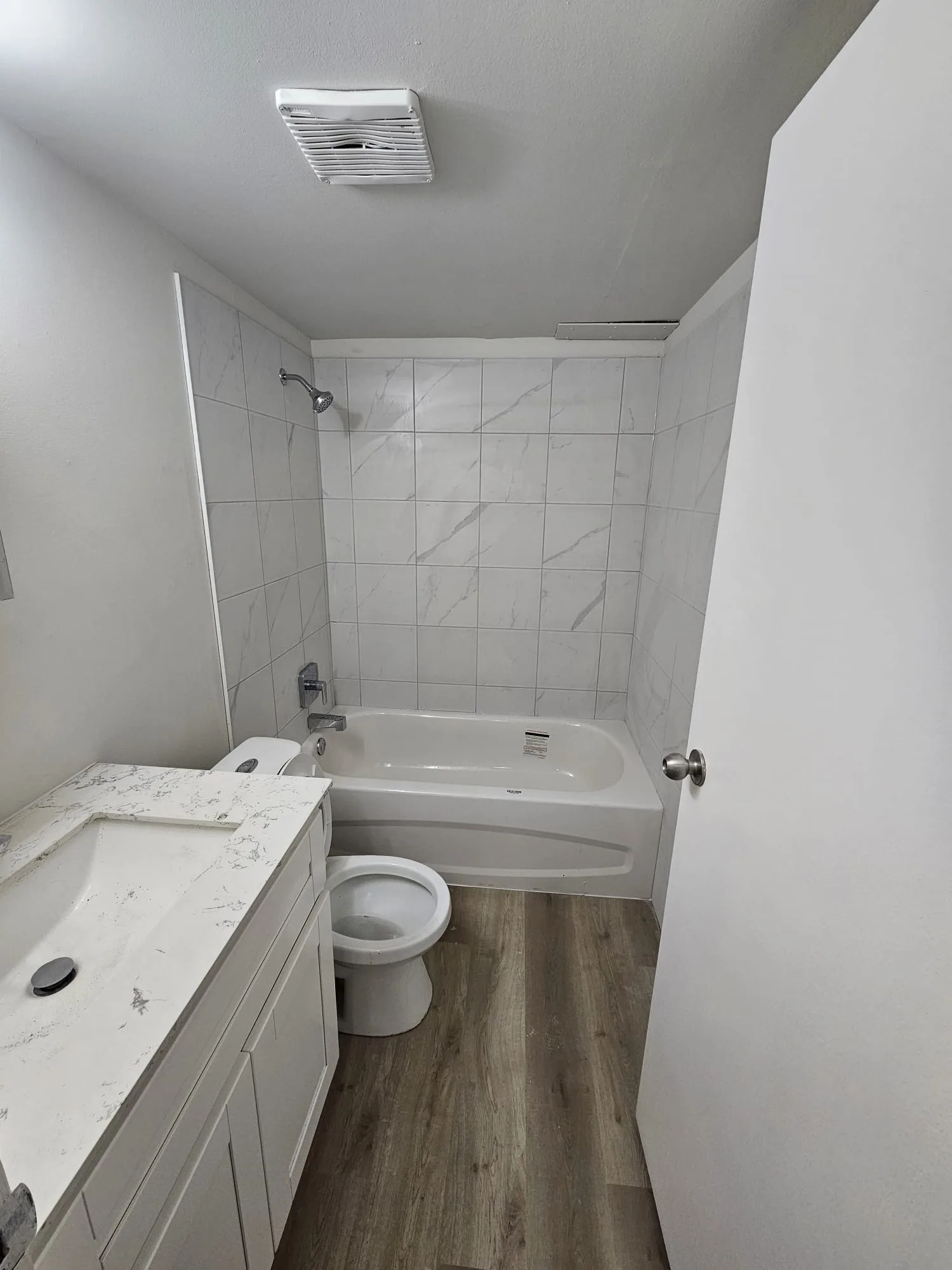 Bathroom Lvp Tile Shower — Stampede Flooring Calgary