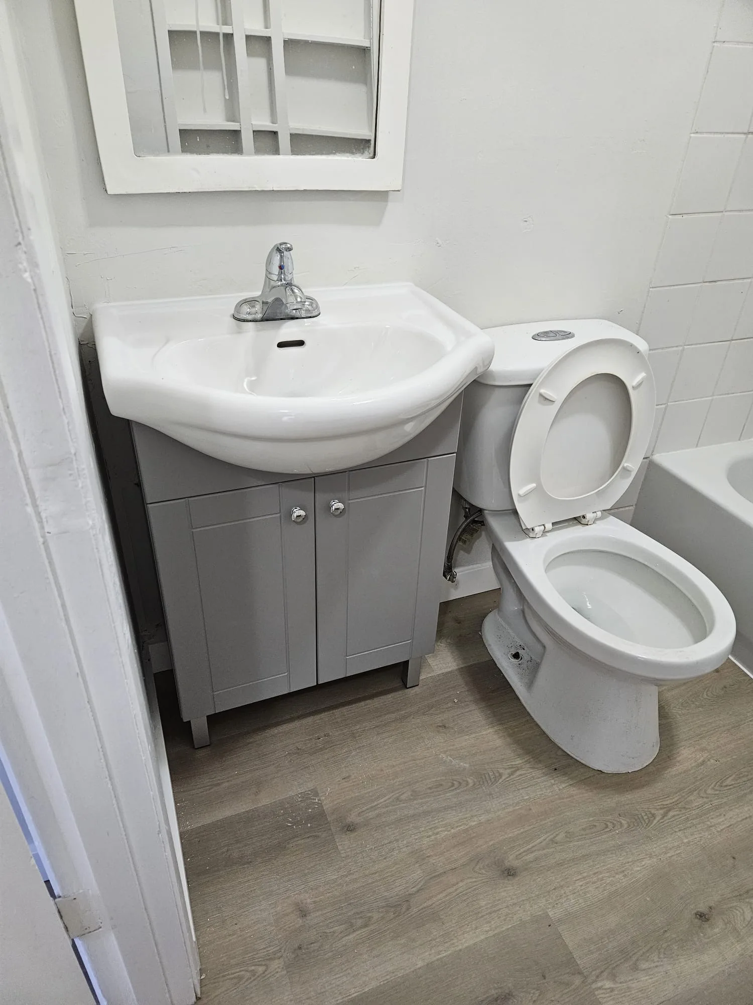 Bathroom Lvp Toilet Vanity — Stampede Flooring Calgary