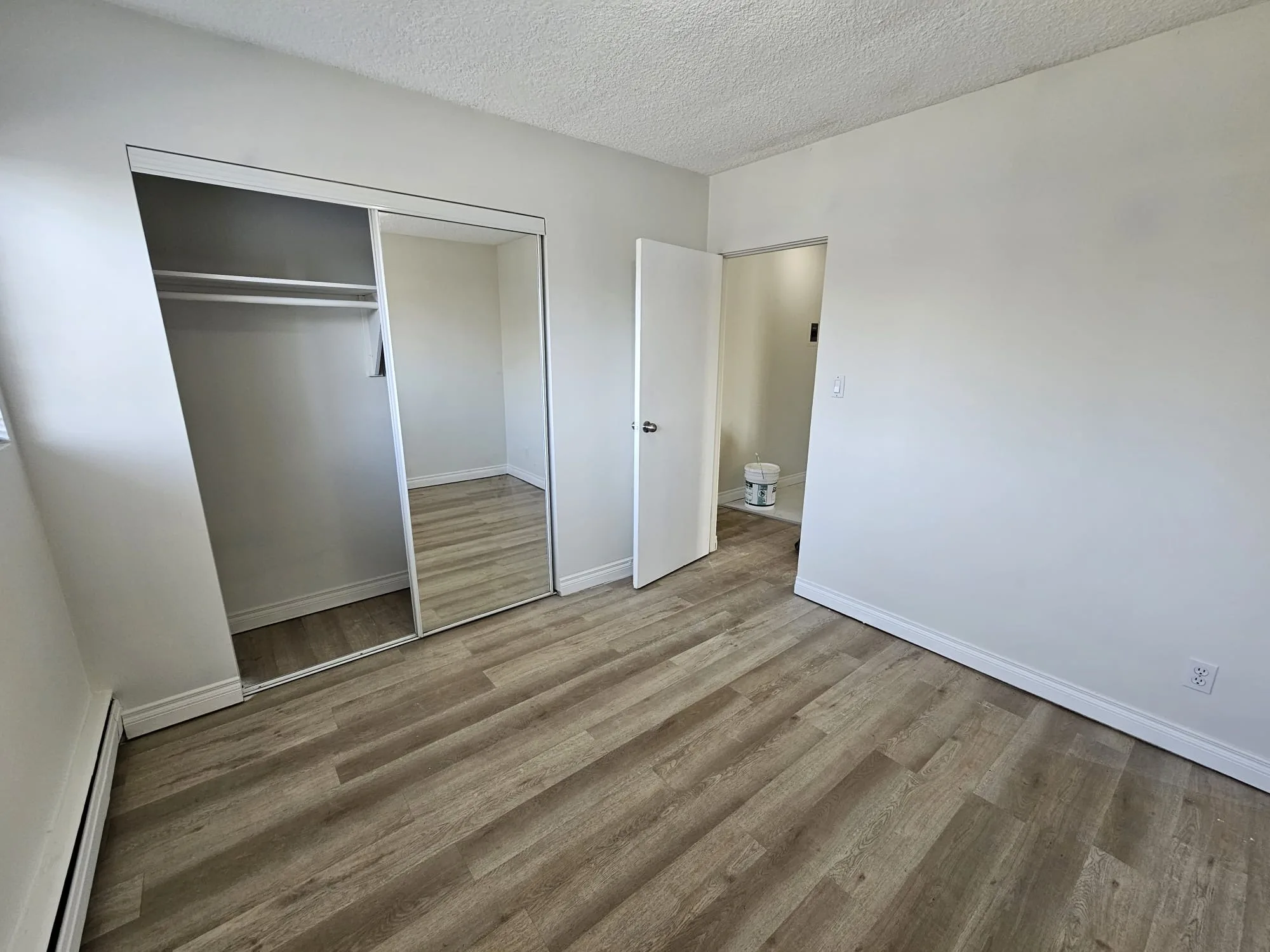Lvp Bedroom Closet Brown — Stampede Flooring Calgary