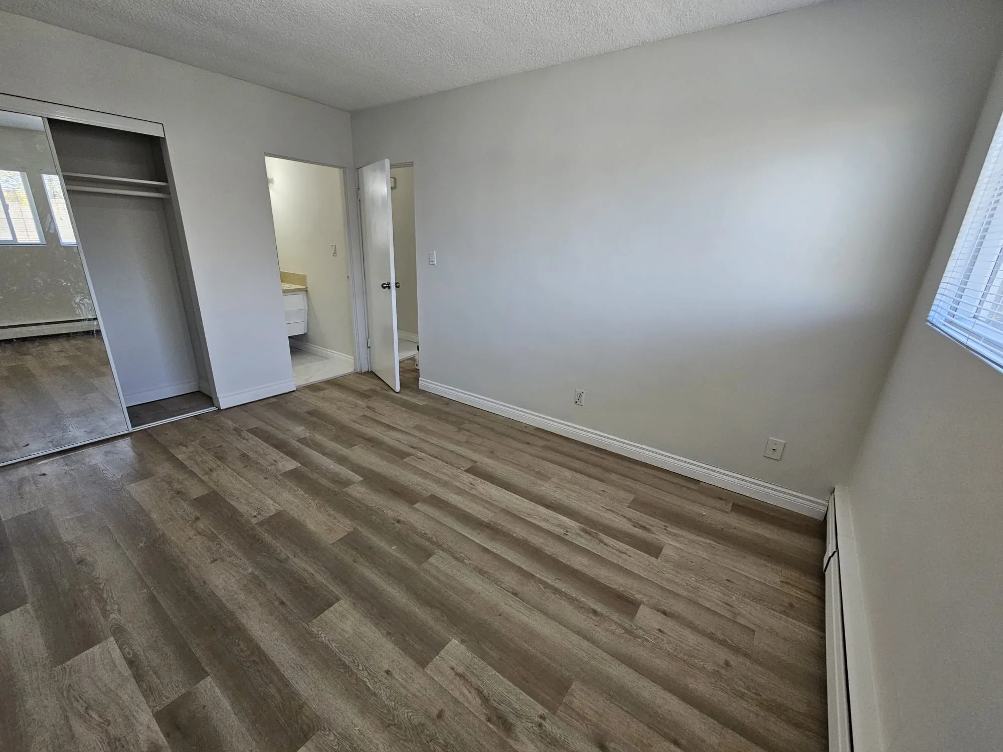 Lvp Bedroom Closet Mirror — Stampede Flooring Calgary