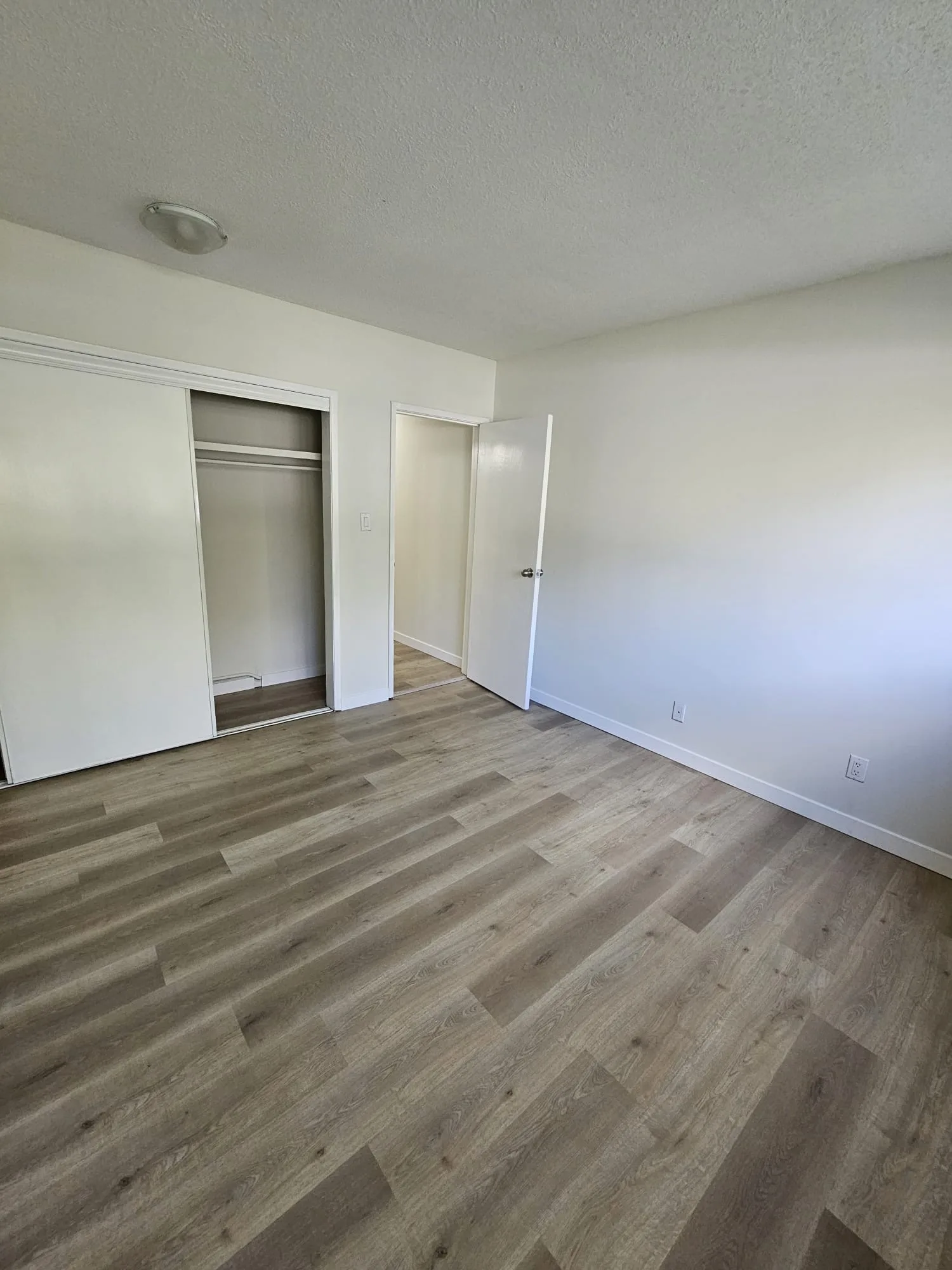 Lvp Bedroom Closet Tan — Stampede Flooring Calgary