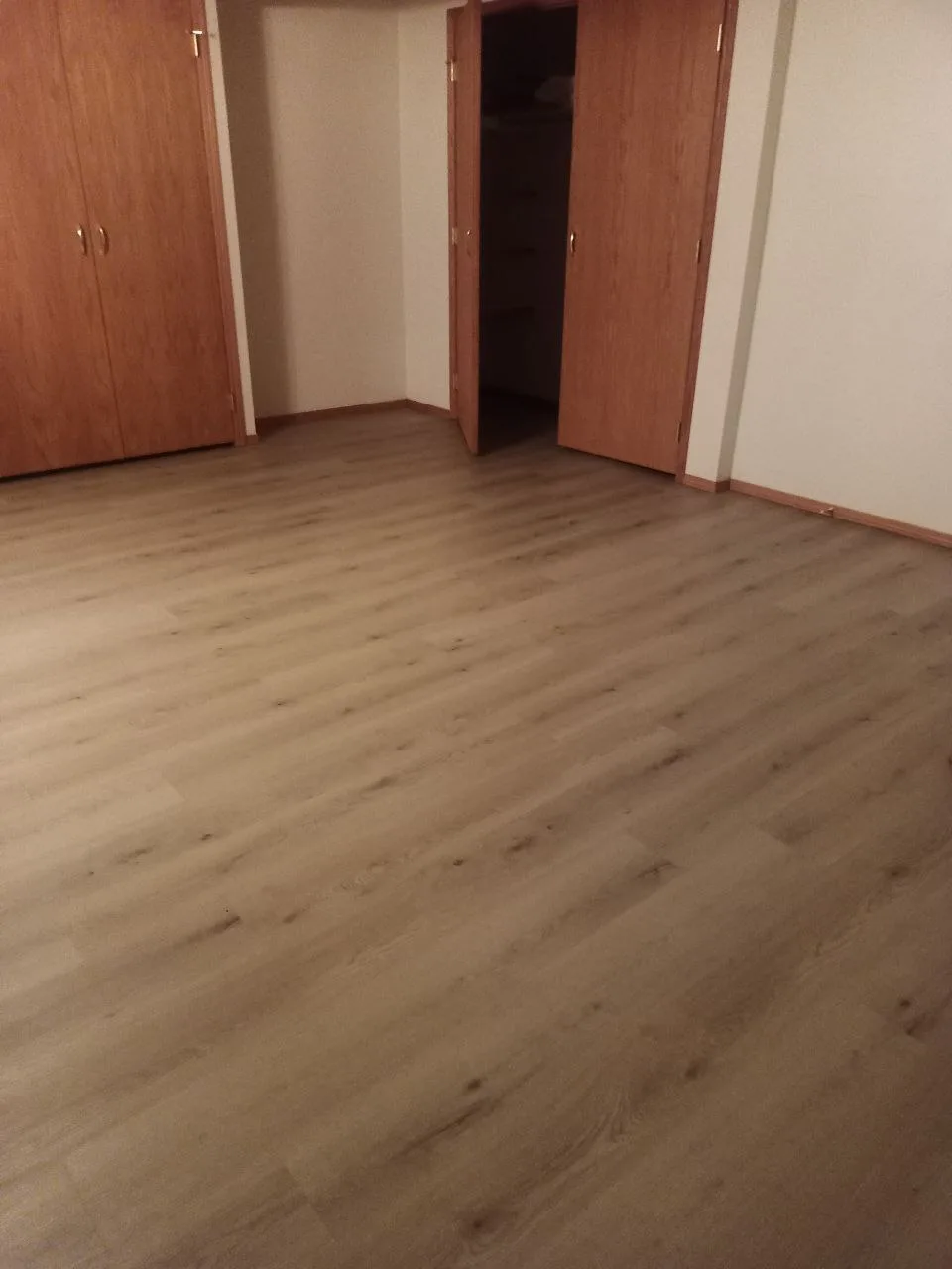 Lvp Bedroom Dark Wooden Closets — Stampede Flooring Calgary