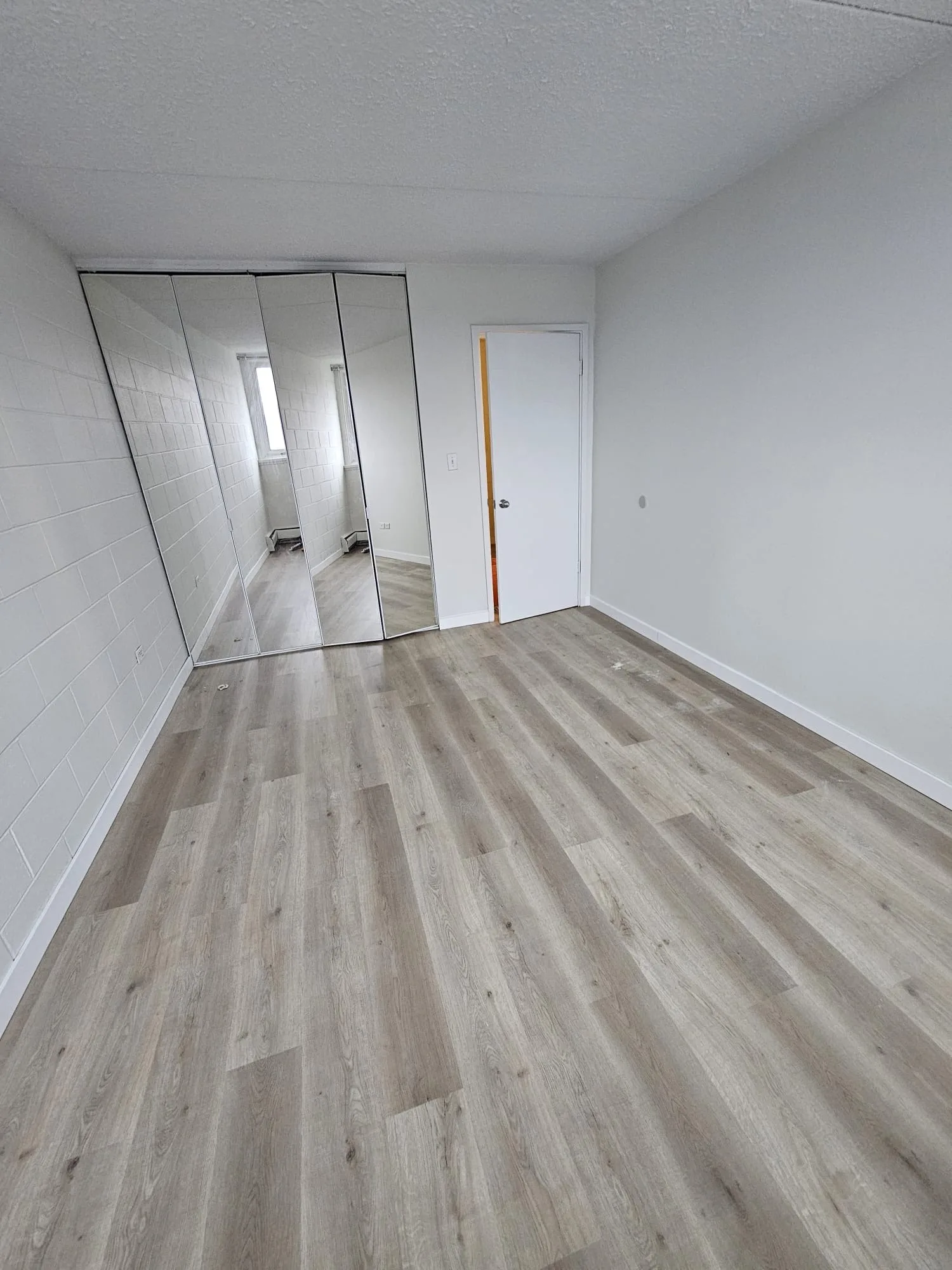 Lvp Bedroom Mirror Closet — Stampede Flooring Calgary
