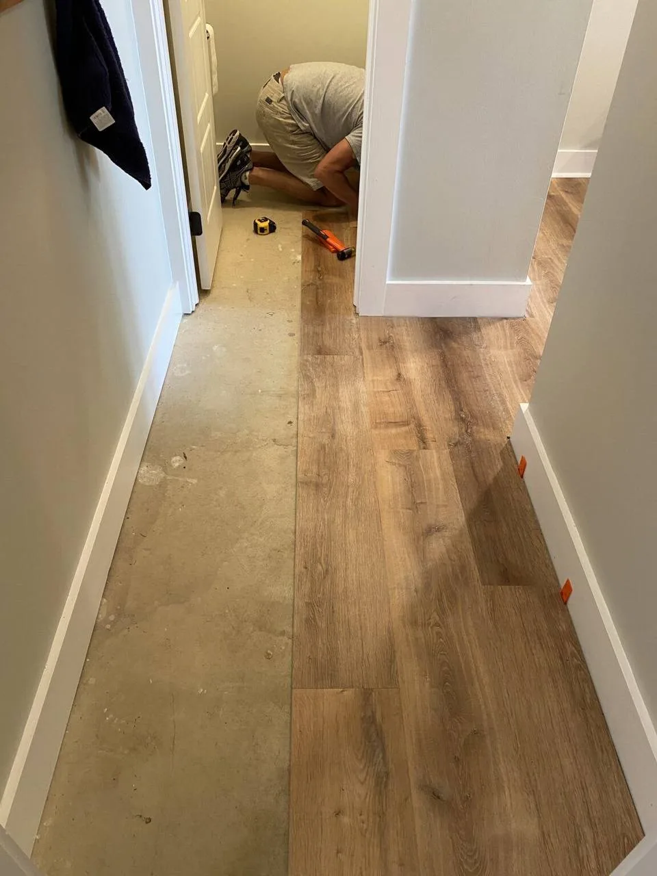 Lvp Hallway Install In Progress — Stampede Flooring Calgary