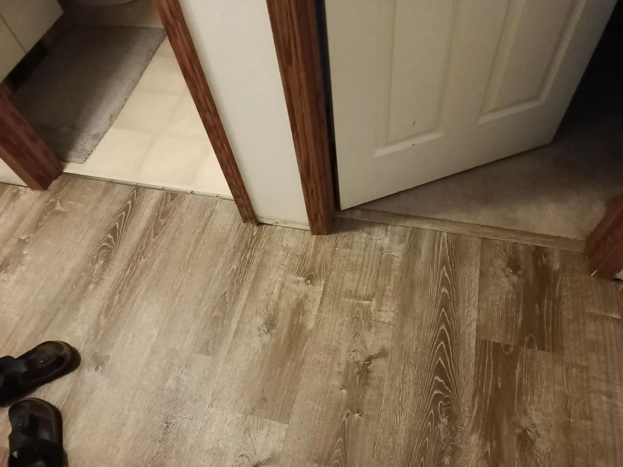 Lvp Hallway Transition — Stampede Flooring Calgary