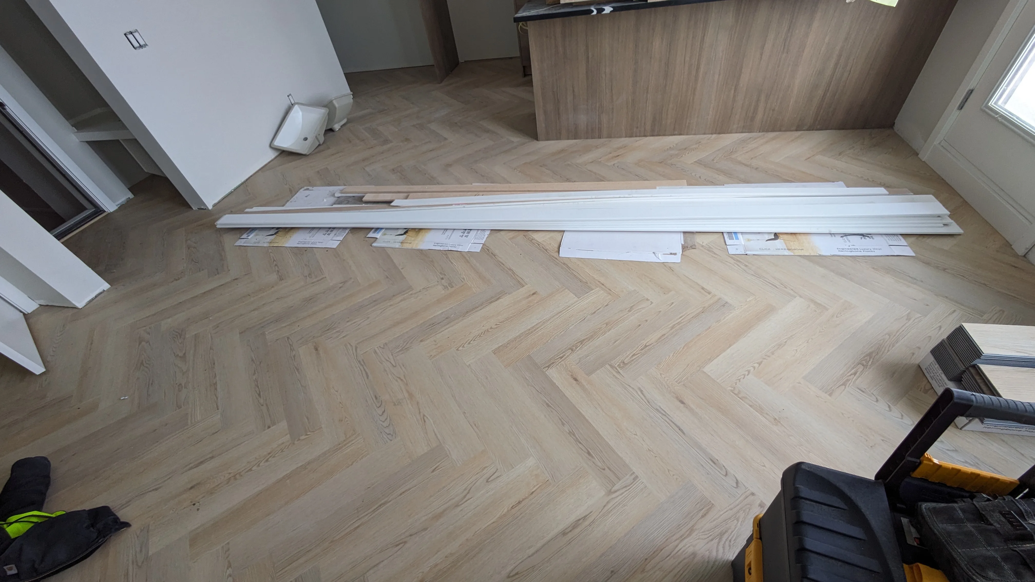 Lvp Herringbone Open Plan — Stampede Flooring Calgary