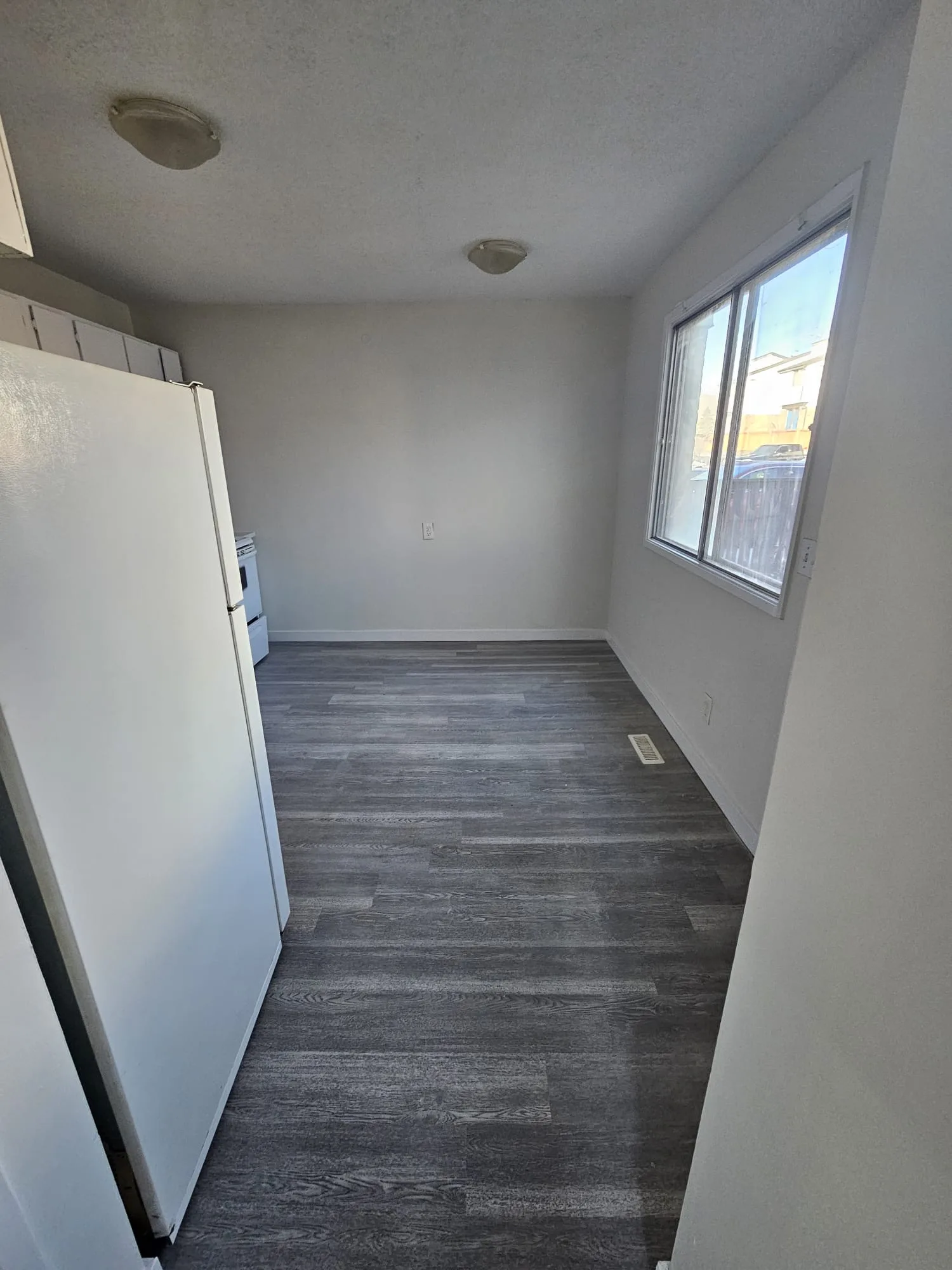Lvp Kitchen Dining Dark Grey 2 — Stampede Flooring Calgary