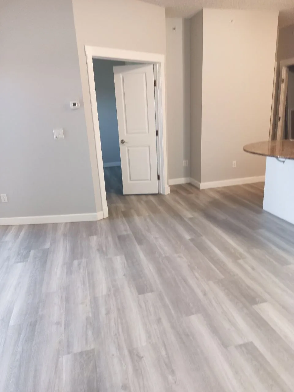 Lvp Open Concept Light Grey — Stampede Flooring Calgary