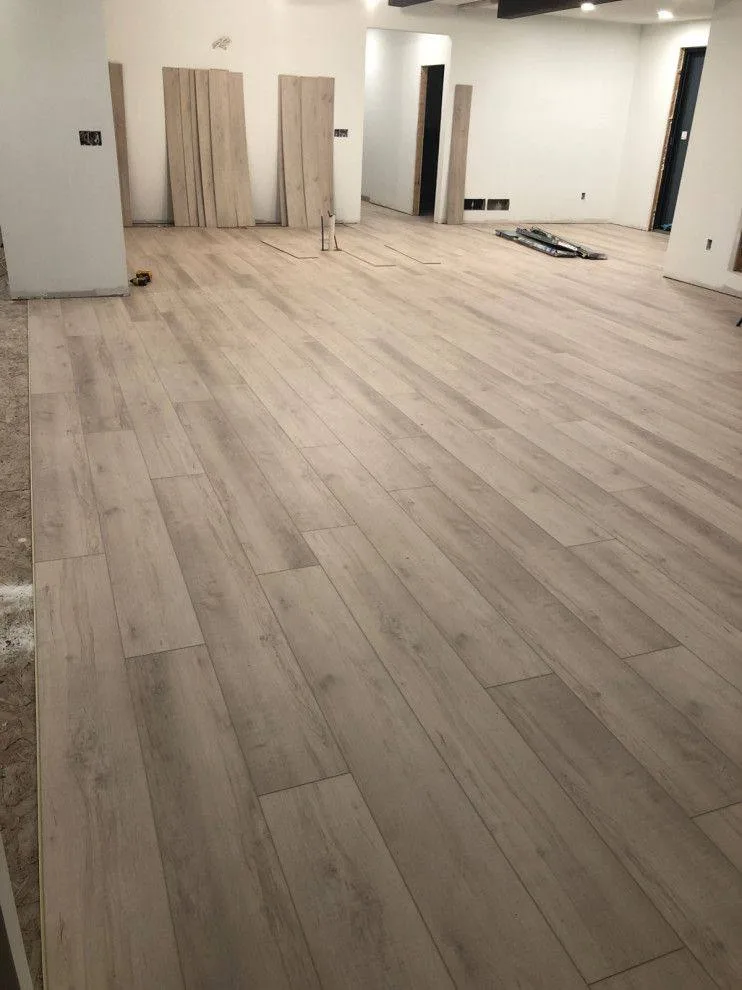 Lvp Open Plan Light Install In Progress — Stampede Flooring Calgary