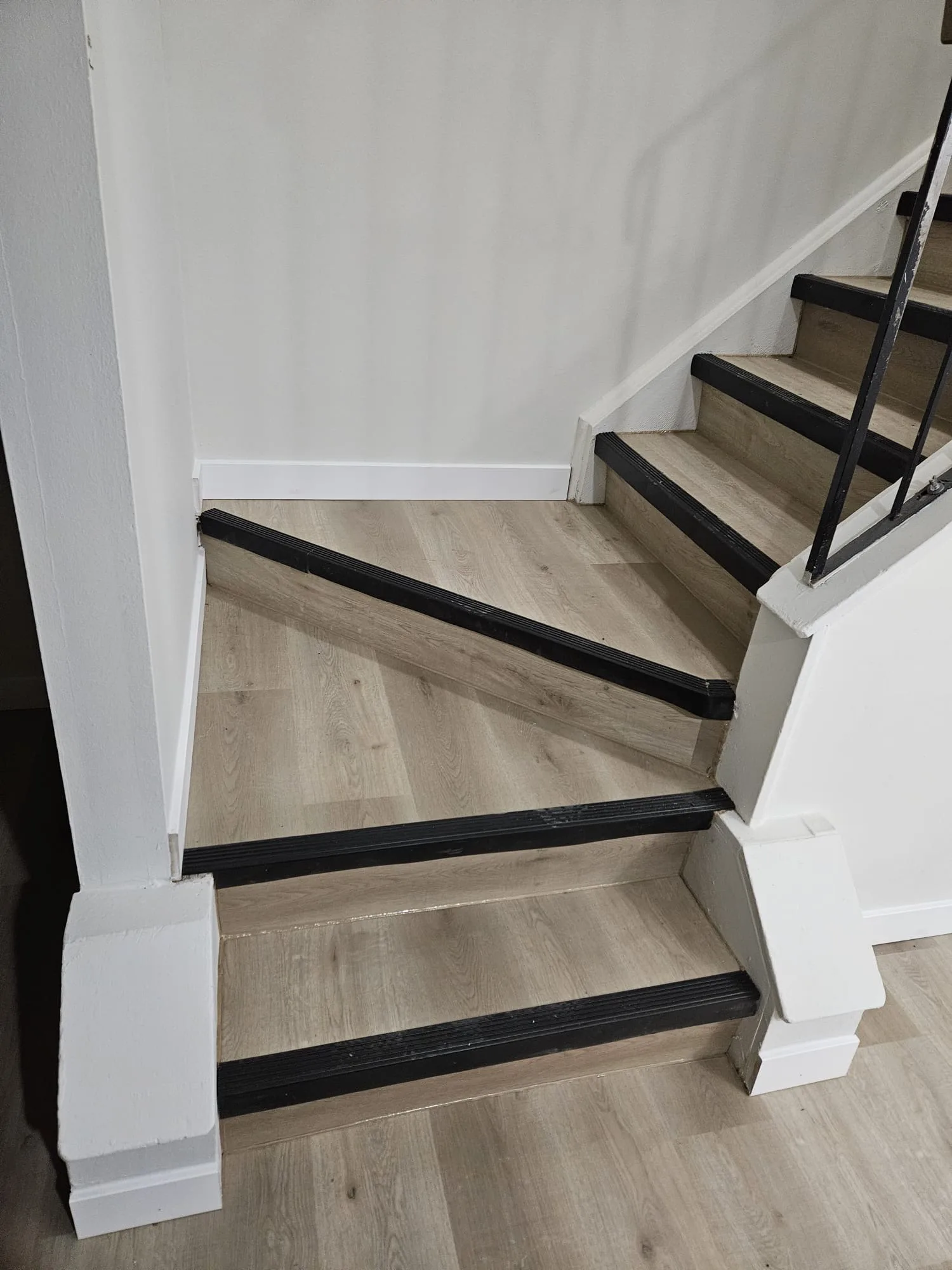 Staircase Lvp Black Nosing — Stampede Flooring Calgary