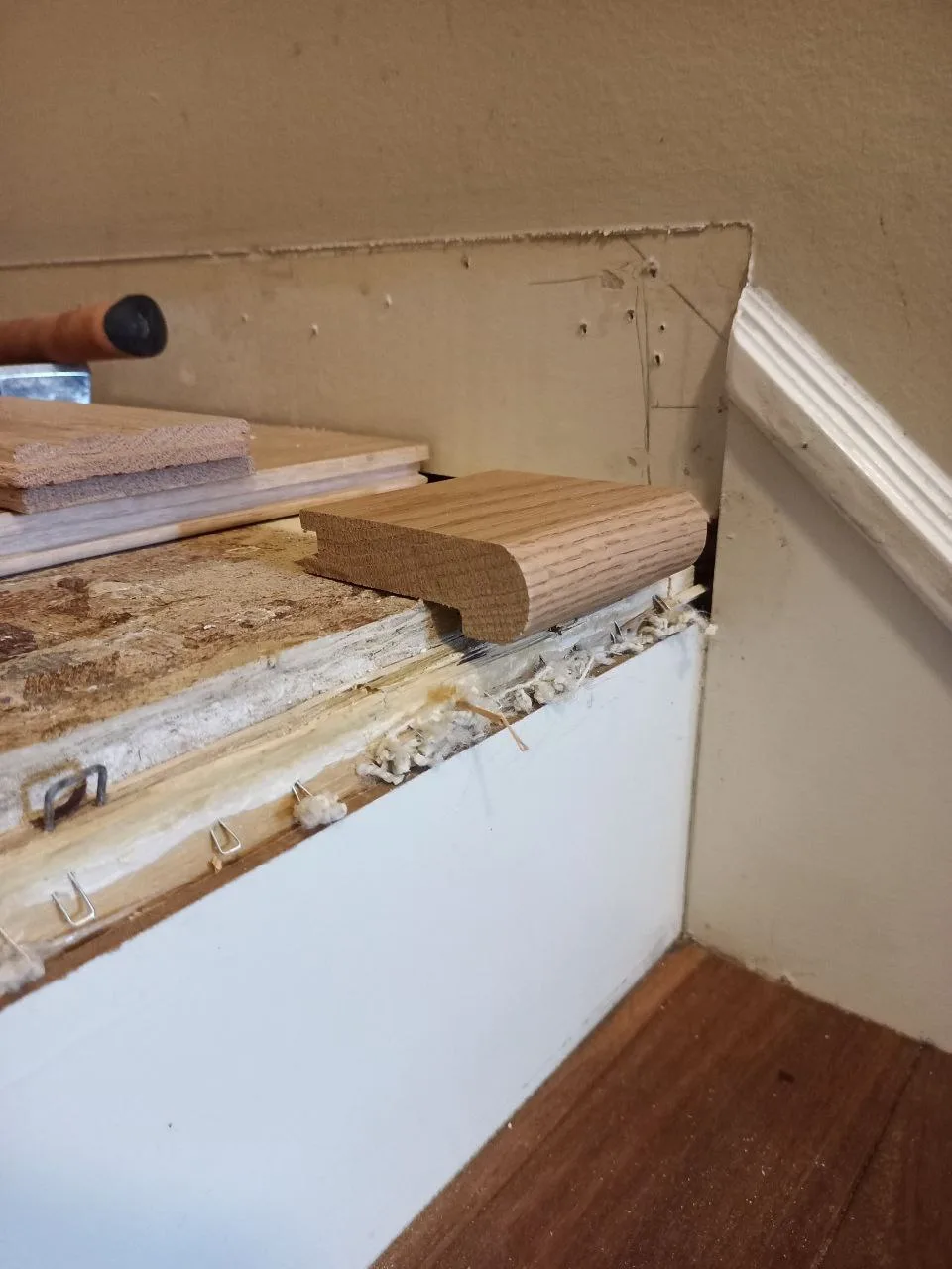 Staircase Nosing Baseboard Install — Stampede Flooring Calgary