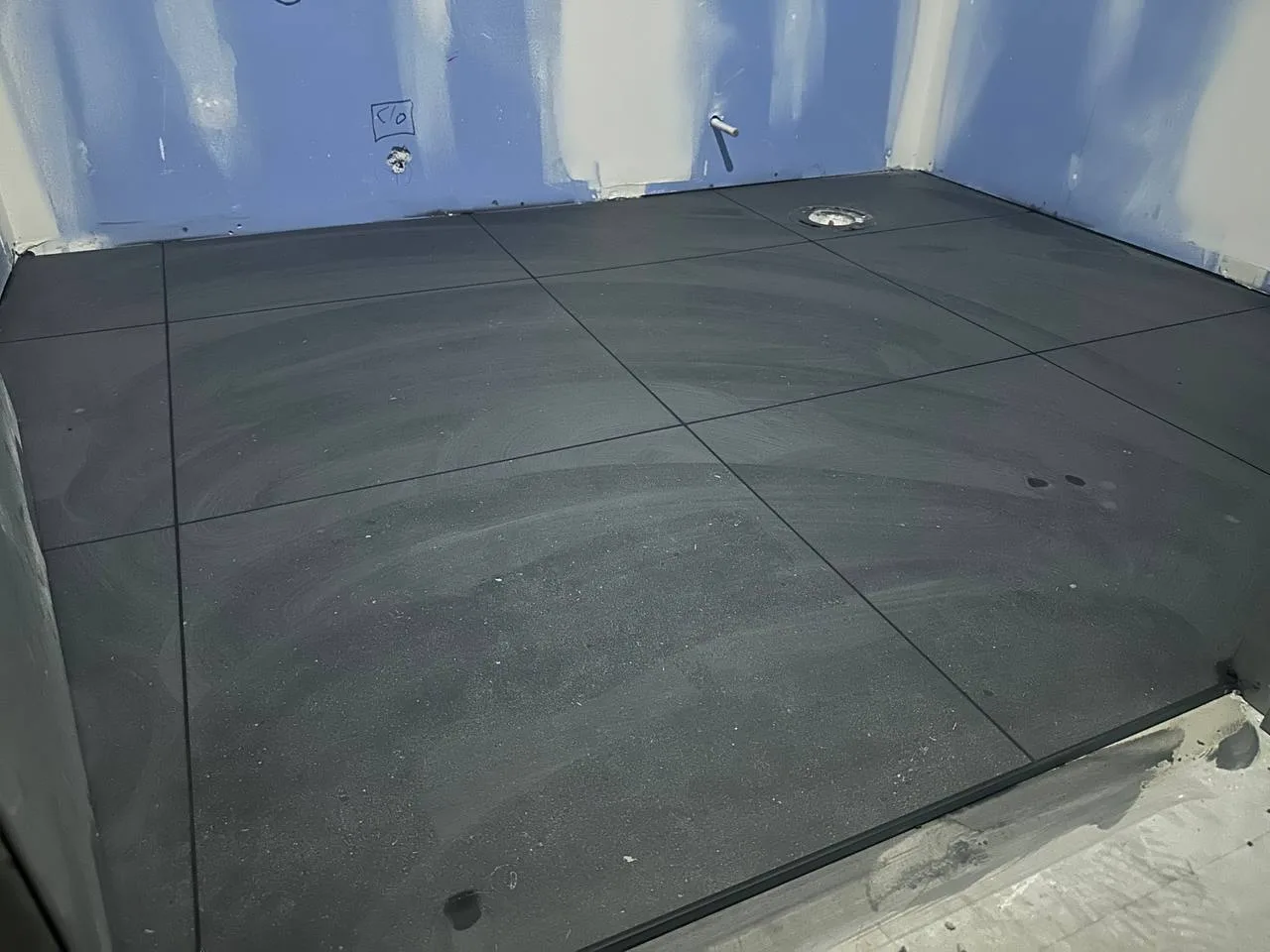 Tile Black Large Format Bathroom — Stampede Flooring Calgary