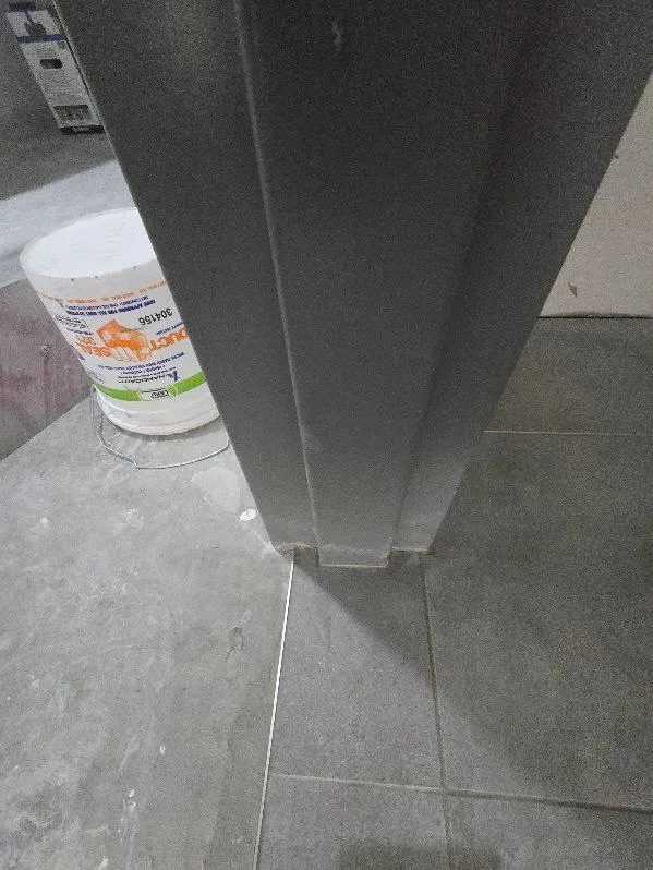 Tile Grey Column Closeup — Stampede Flooring Calgary
