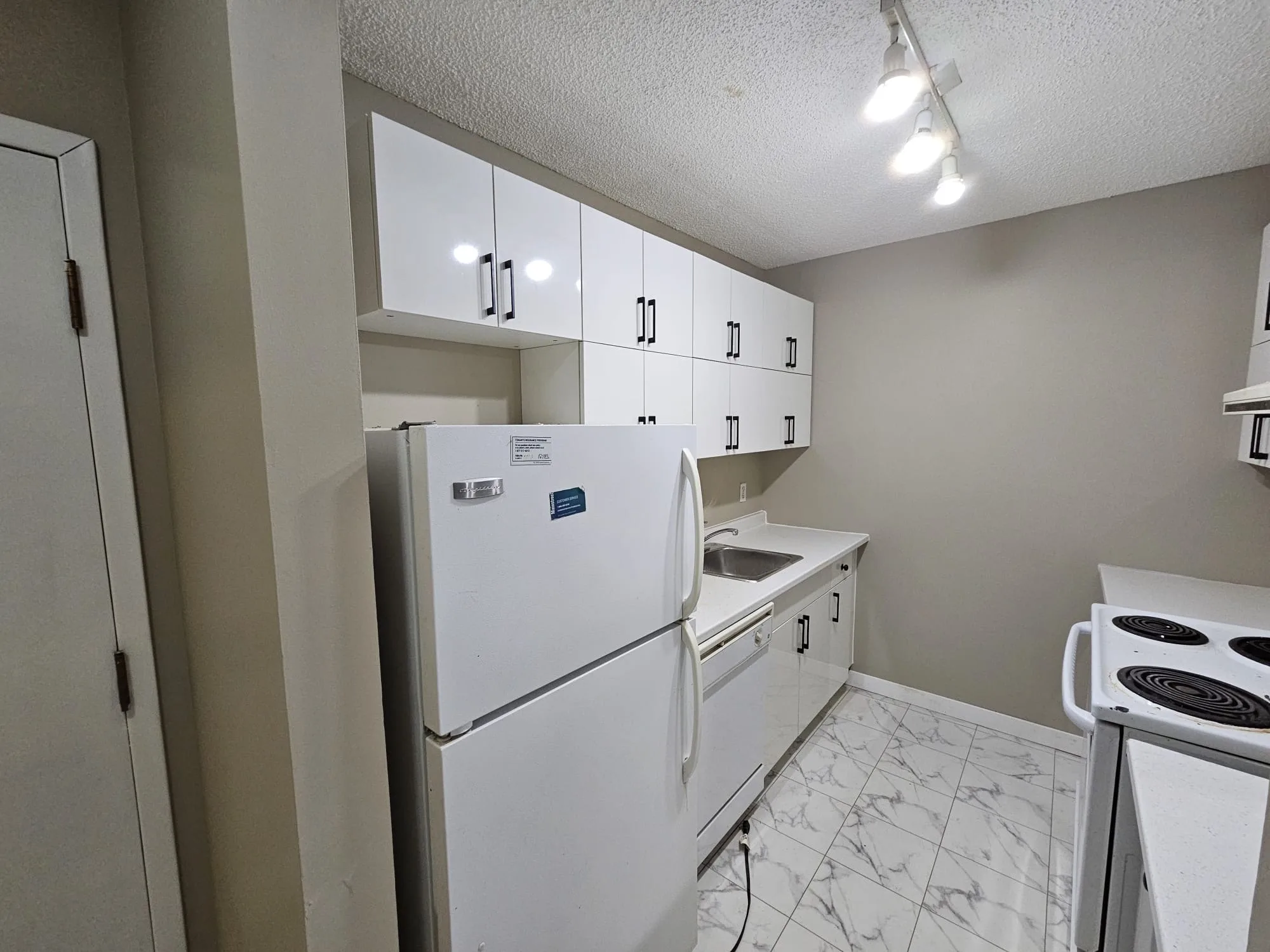 Tile Kitchen Marble Look Finished — Stampede Flooring Calgary