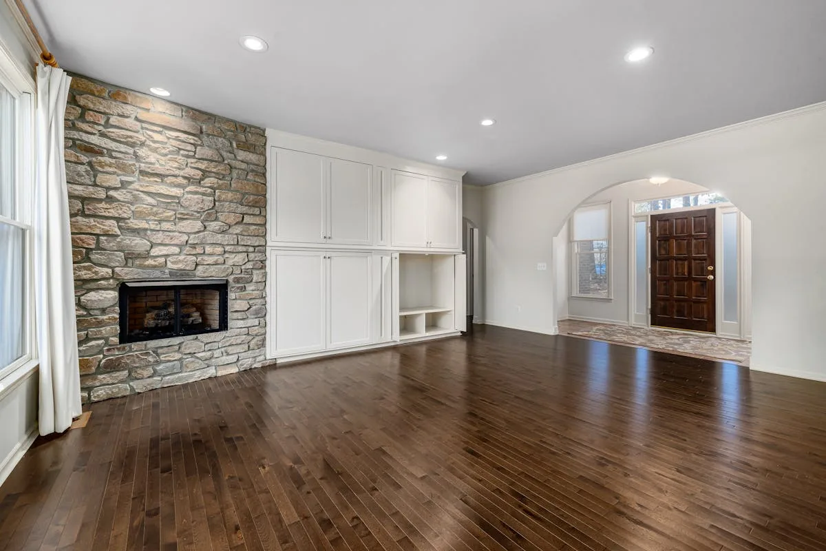 Full main floor flooring renovation in NW Calgary — before and after LVP installation