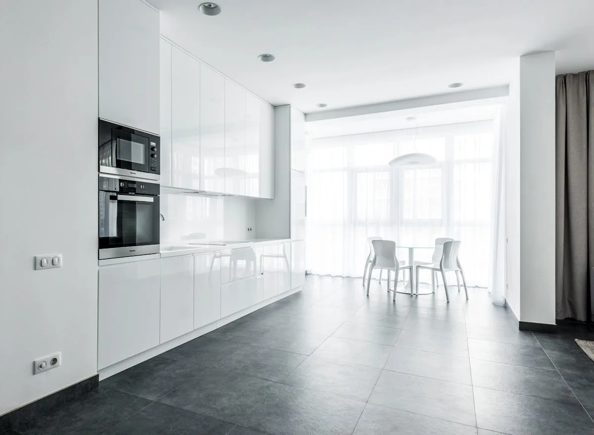 Large format tile flooring installed in a Calgary home — modern porcelain with clean grout lines