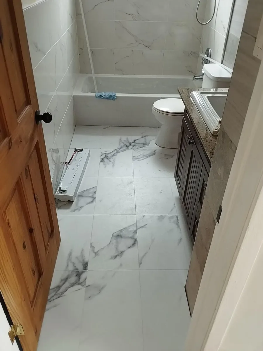 Full bathroom tile renovation in NW Calgary — new floor and shower tile